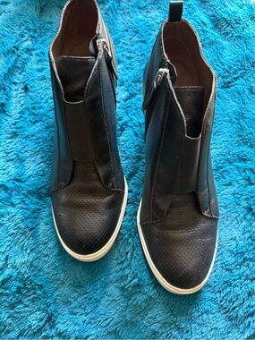 Poalo Black Perforated Wedge Zip-up Ankle Booties with White Sole